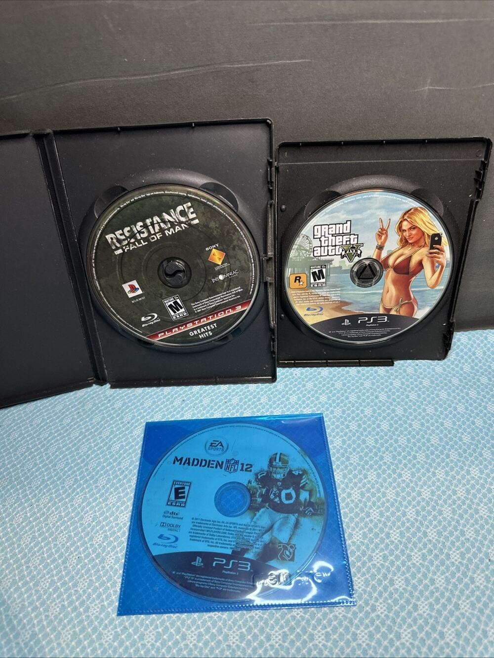 PlayStation 3 Game Bundle Lot of 3 Discs Madden12, Resistance Fall Of Man, GTA5